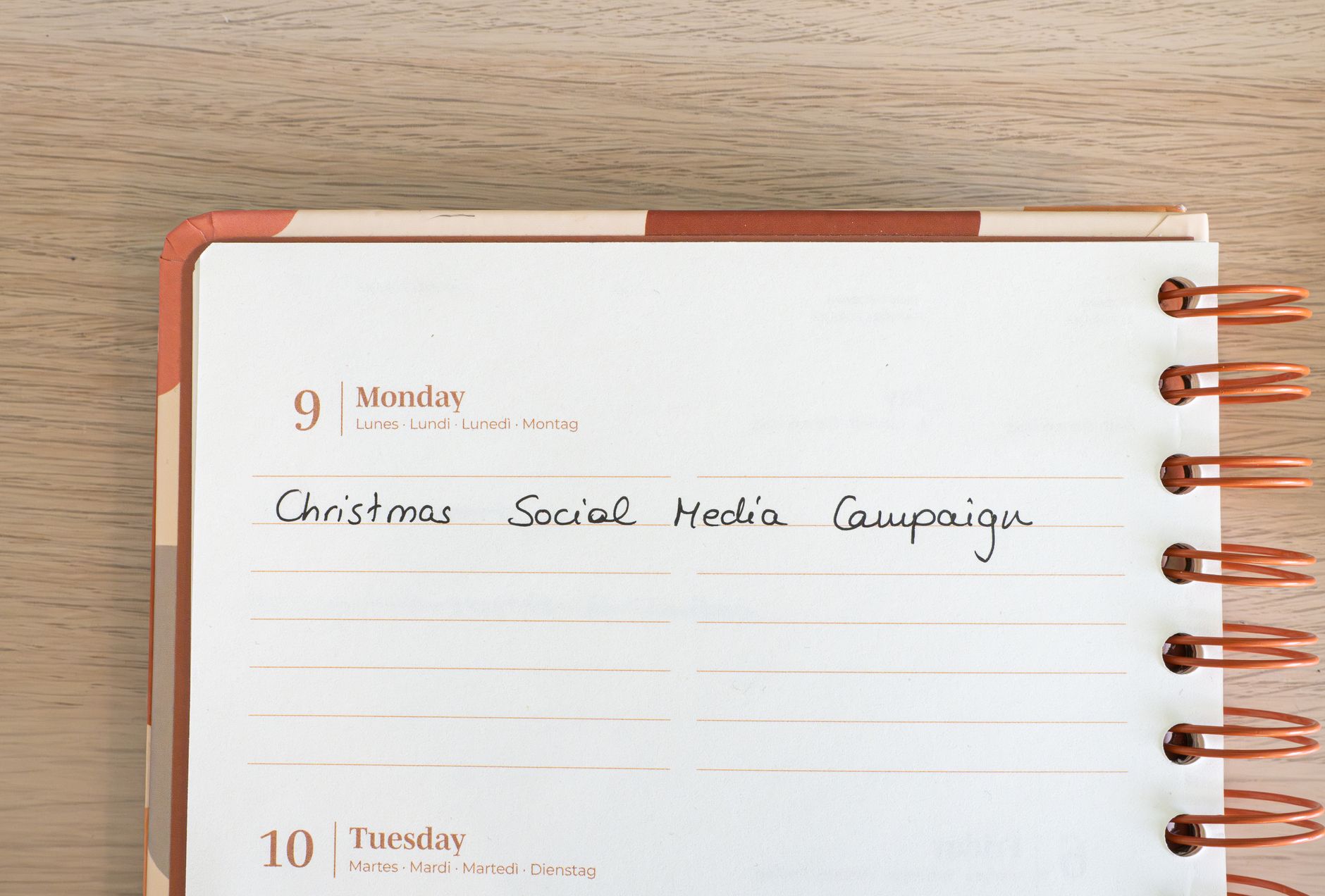Planner page with note for a Christmas social media campaign.